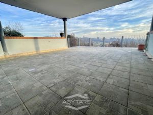 Appartamento con terrazzo e giardino privato