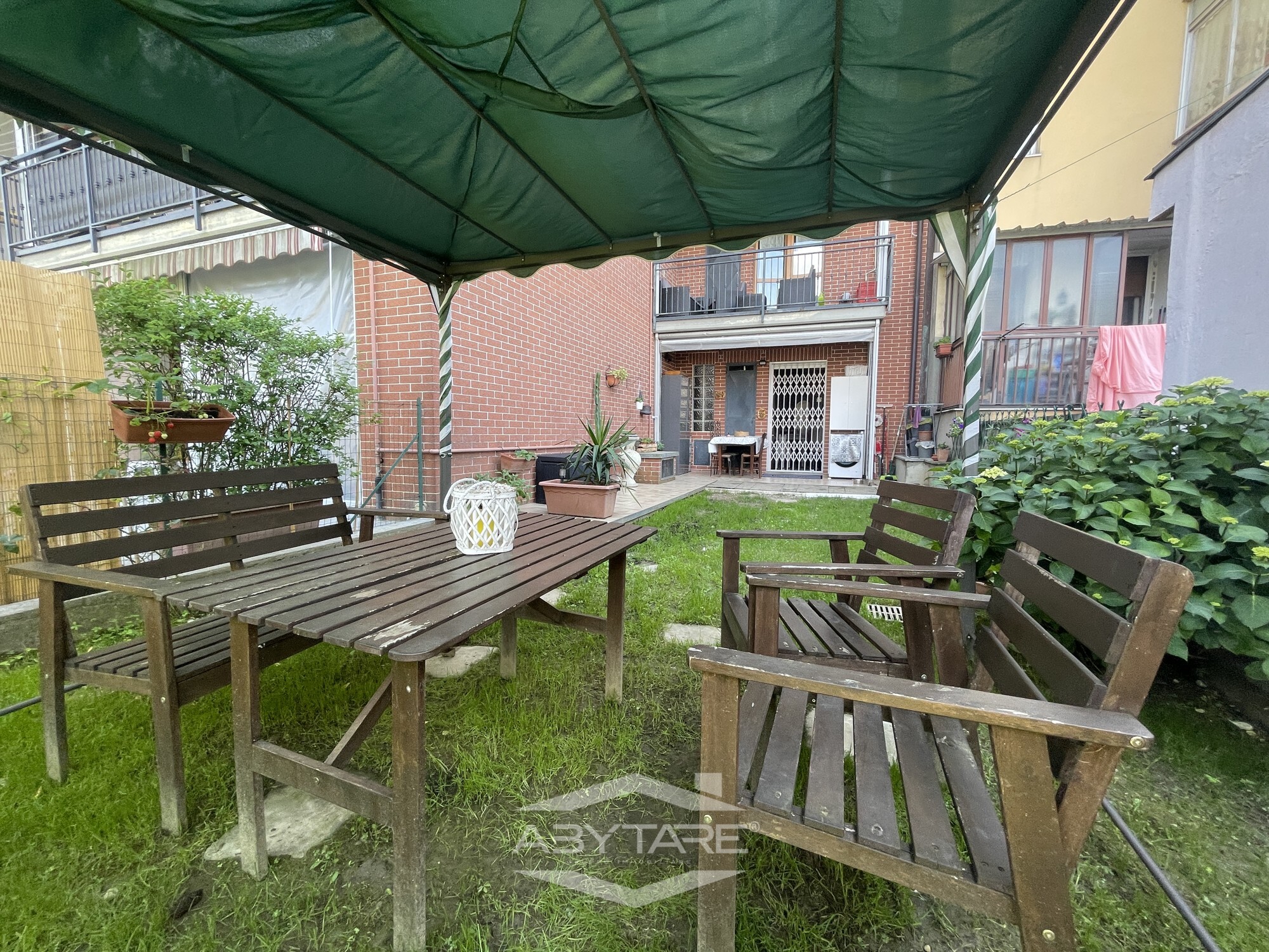 Bilocale con giardino in palazzina recente a NIchelino
