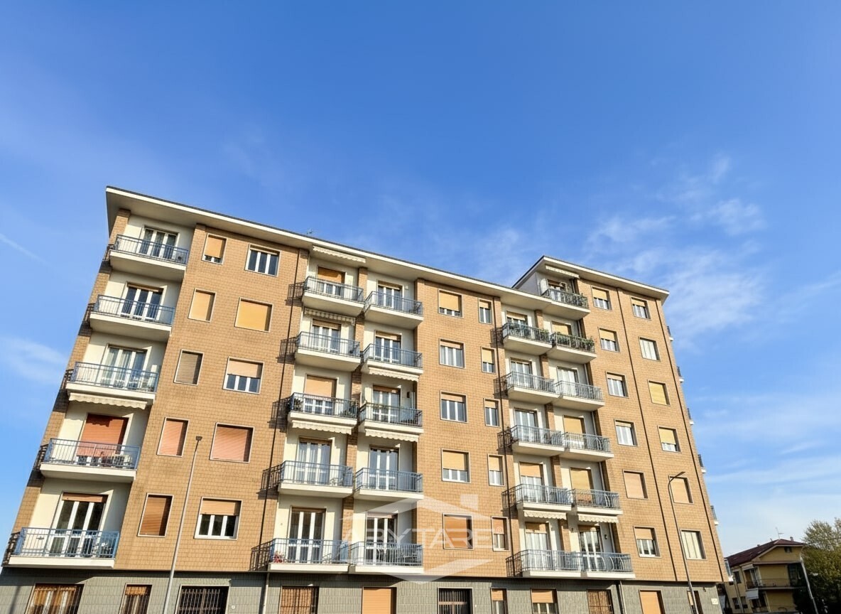 3 locali con box auto affittasi Moncalieri Via Turati 4