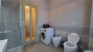 APPARTAMENTO IN VILLA CON GIARDINO E BOX