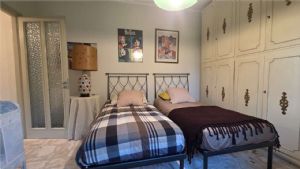 APPARTAMENTO IN VILLA CON GIARDINO E BOX