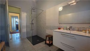 APPARTAMENTO IN VILLA CON GIARDINO E BOX