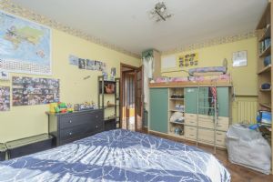 VILLA A SCHIERA CON GIARDINO E AMPIO BOX AUTO