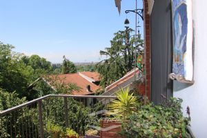 Elegante appartamento con mansarda Torino precollina