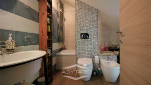 Elegante appartamento con mansarda Torino precollina