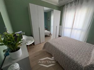 TRILOCALE COMPLETAMENTE RISTRUTTURATO IN PICCOLA PALAZZINA